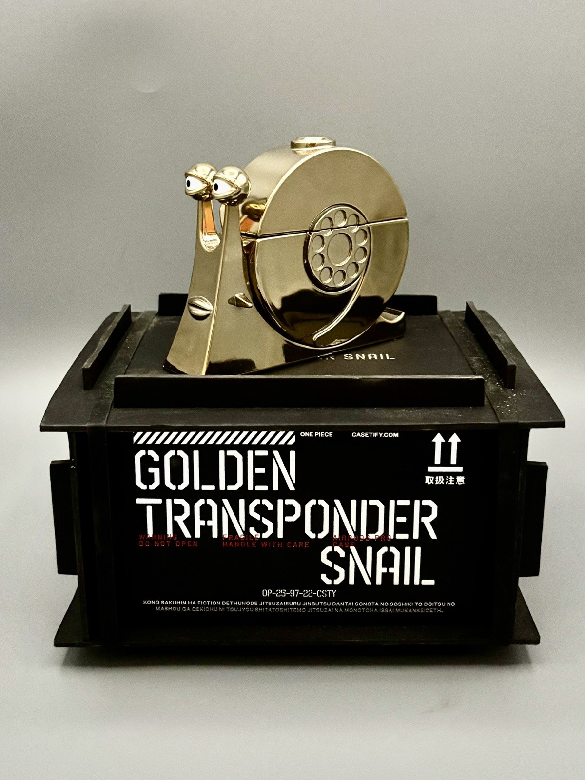 Casetify One Piece Golden Transponder Snail AirPods Pro Case Buster Call-image