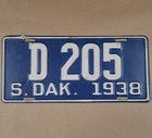 1938 South Dakota Dealer License Plate D205 Original Paint 11 7/8" x 5 3/8" — photo 1
