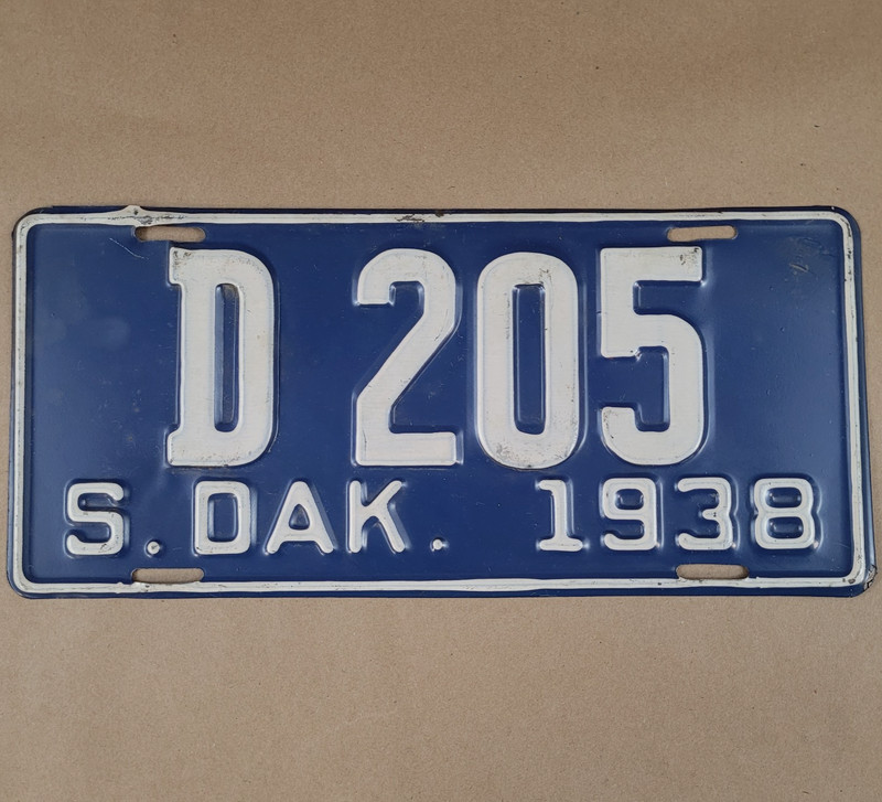 1938 South Dakota Dealer License Plate D205 Original Paint 11 7/8" x 5 3/8"