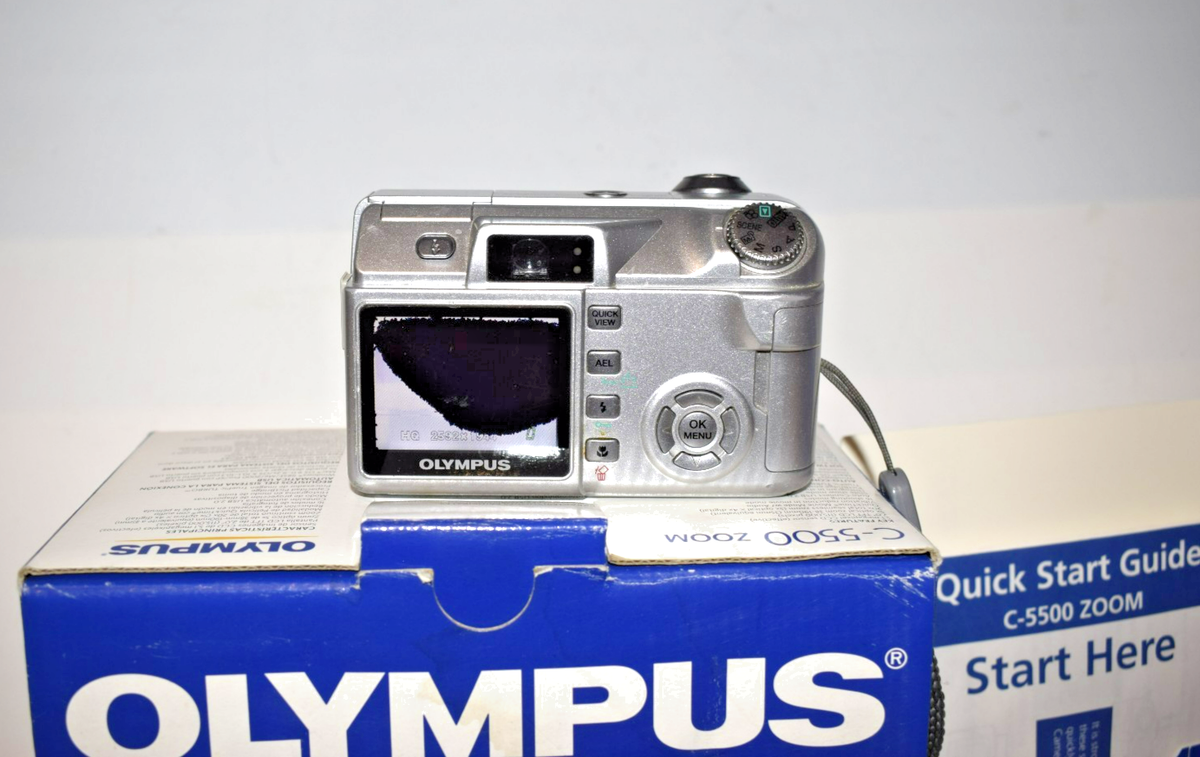 Olympus Stylus 7010 D33235 12.0MP Point and Shoot Digital Camera