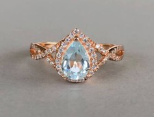 2ct Lab-Created Blue Aquamarine Halo Infinity Engagement Ring Rose Gold Plated