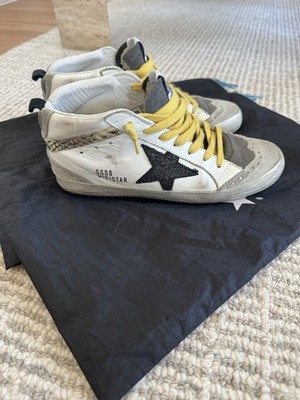 Golden Goose Mid Star Sneakers in white leather with black star And Yellow Laces