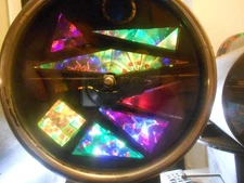 8 view muti kaleidoscope  4" diameter 5 inch wheels  beautiful with stand