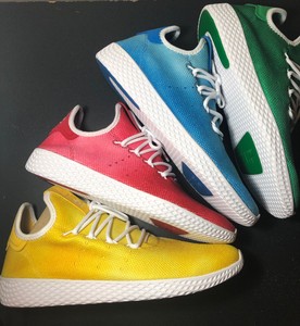 tenis human race precio