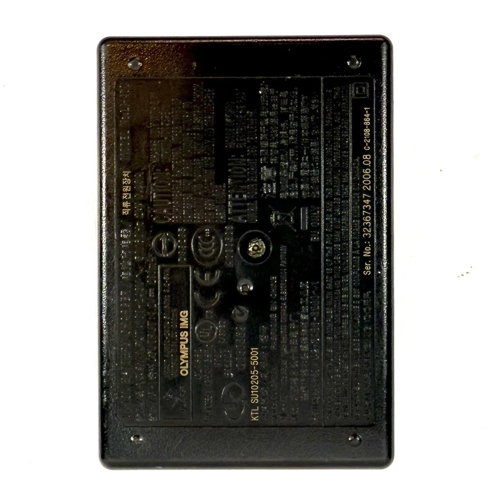 Cargador Olympus OEM Stylus LI-40C para batería Olympus LI-42B **SOLO CARGADOR** Foto 3 de 4