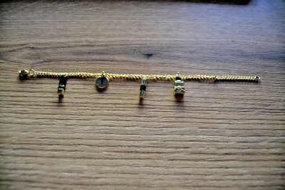 Yves Saint Laurent Armband Charm Bracelet Gold YSL vintage Design