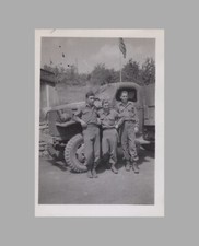 WW2 Photo U.S. Army GIs Leaning Against Military Vehicle
