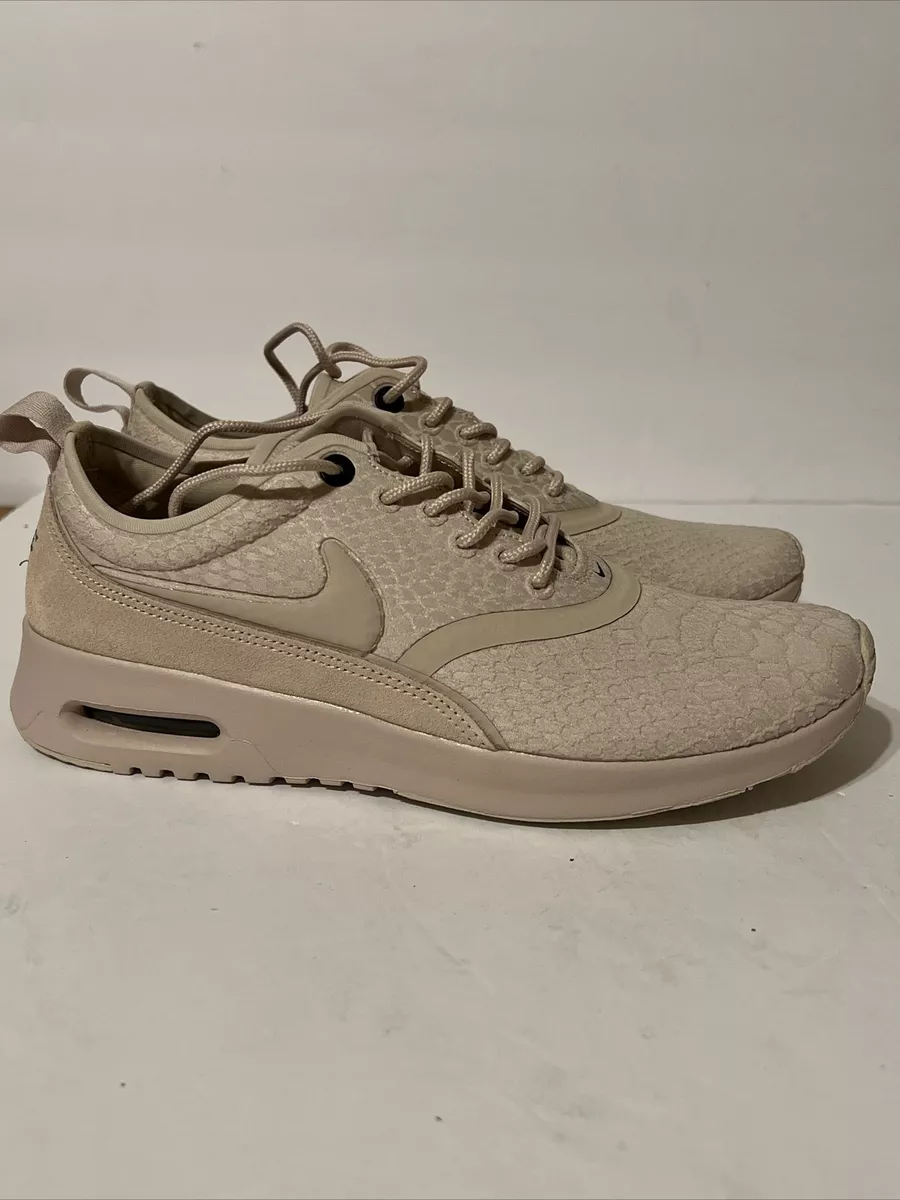 Nike thea beige sale