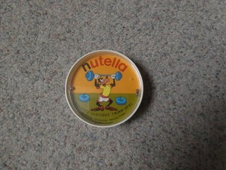 Nutella Deckel Geduldsspiel "Goofy als Gewichtheber" großer Deckel (s.Foto)