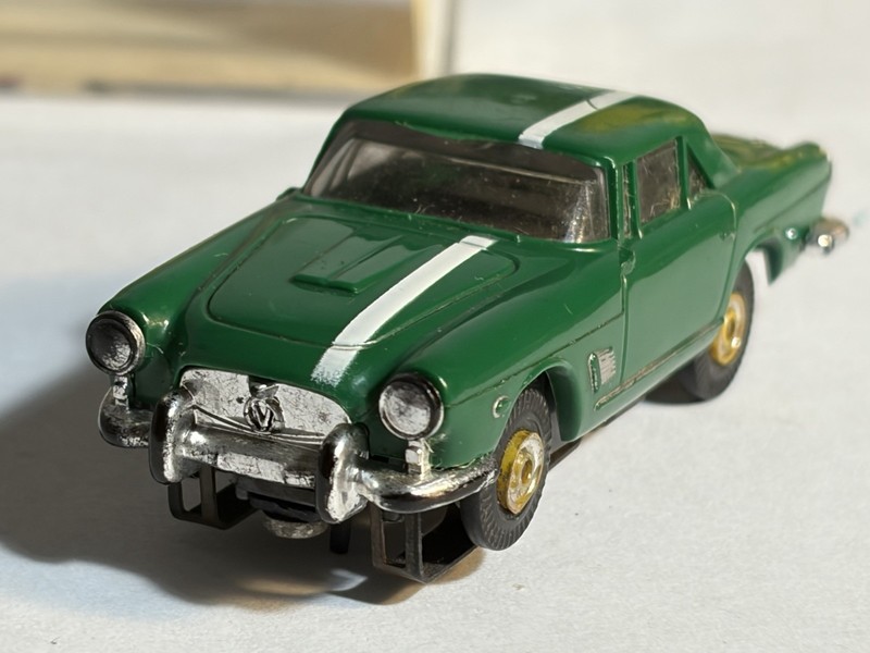 Aurora slot car tjet. Green Maserati with white stripe.