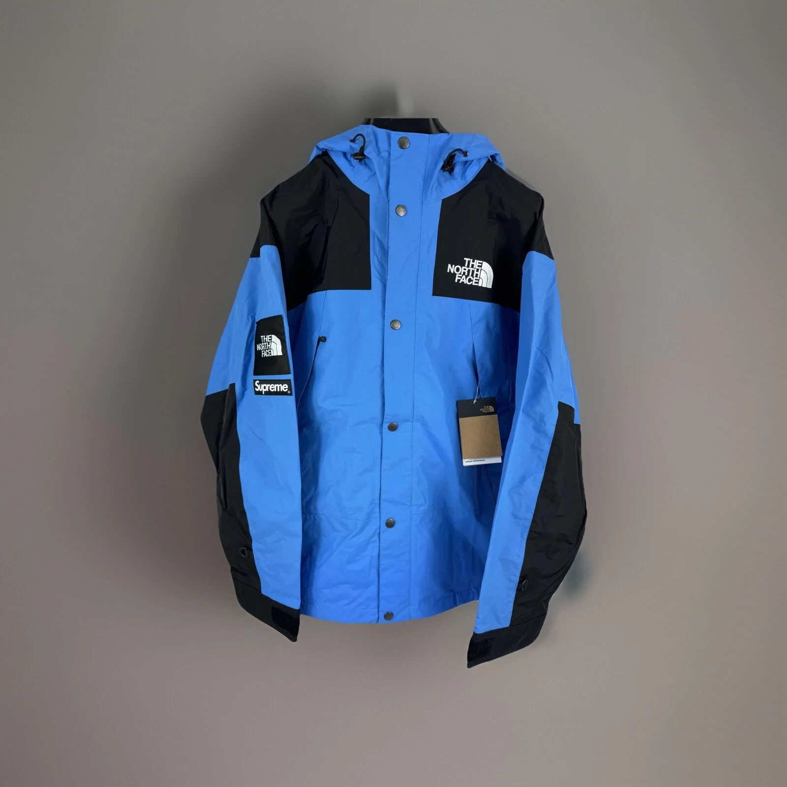 Supreme X The North Face   Veste de montagne bleue Super Sonic brodée avec logo : L