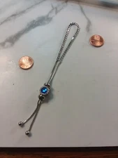 LU 6"-9" Adjustable Tennis Bracelet with Blue Charm Read Description...