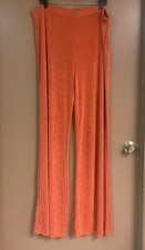 PrettyLittleThing Womenโs plus size light rust/peach glittery flare pants