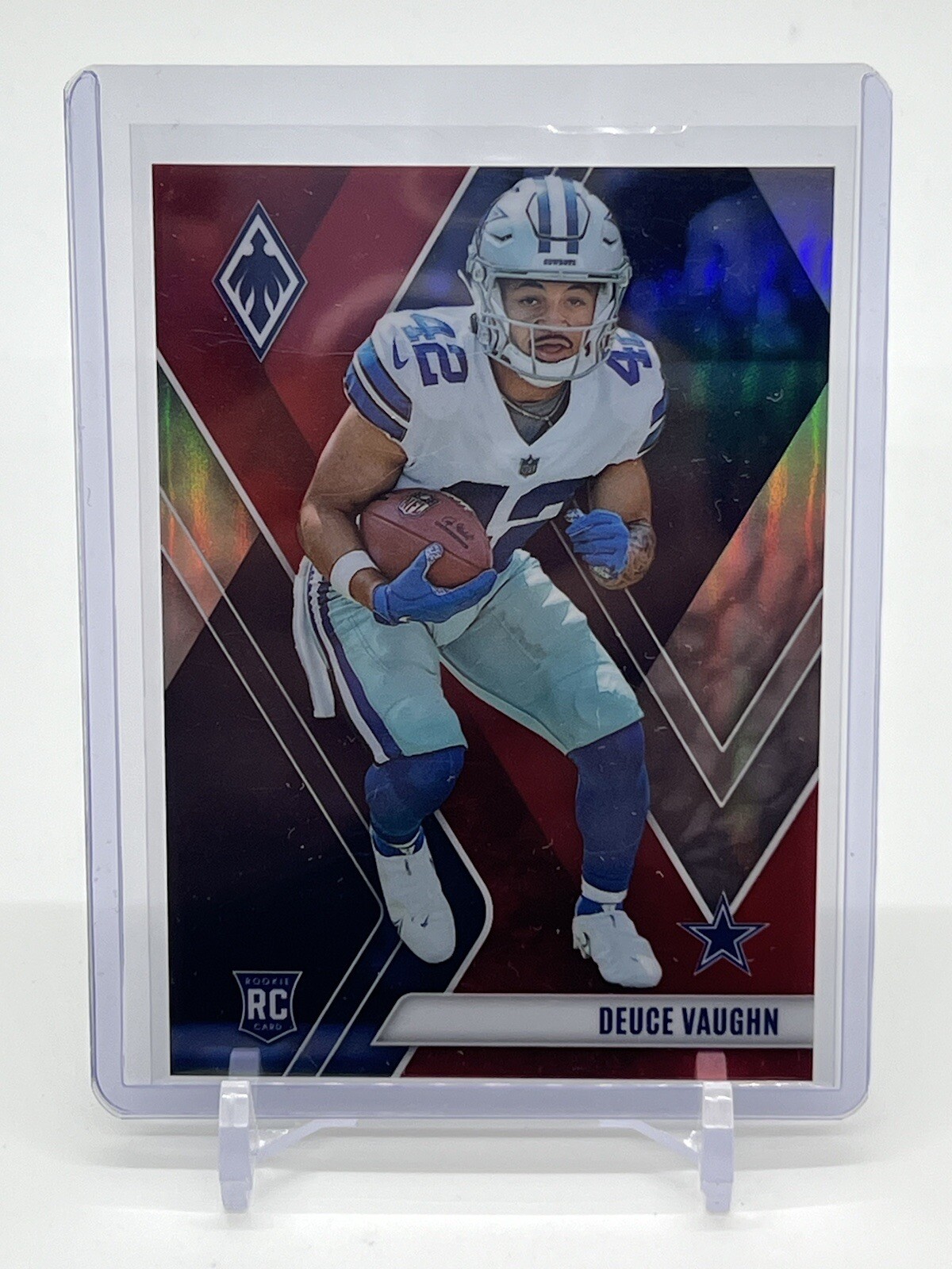 2023 Panini Phoenix Deuce Vaughn #134 Rookie RC Red #’d/250 Dallas Cowboys RB