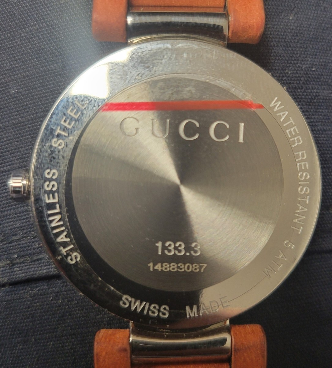 Gucci 133.3 Interlocking Ladies Watch. Orange Leather Band