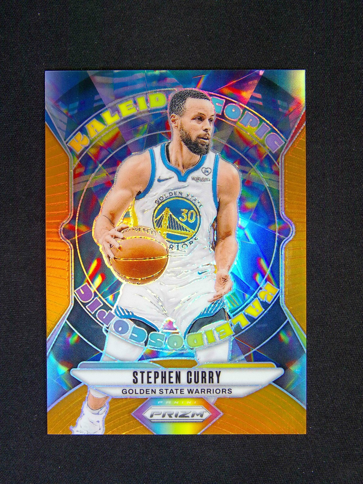 2024-25 Panini Prizm Stephen Curry #12 Kaleidoscopic Orange /49