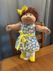 1980s Cabbage Patch Kid Brown Hair Brown Eyes Yellow Blue Daisy Floral Dress