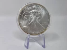 2002 USA Silver Eagle Coin – 1 oz 0.999 Silver in Capsule + COA