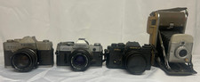  4 Vintage Cameras: Canon AE-1, Yashica FR I ML 1.7, Petri FT EE, Polaroid 80A