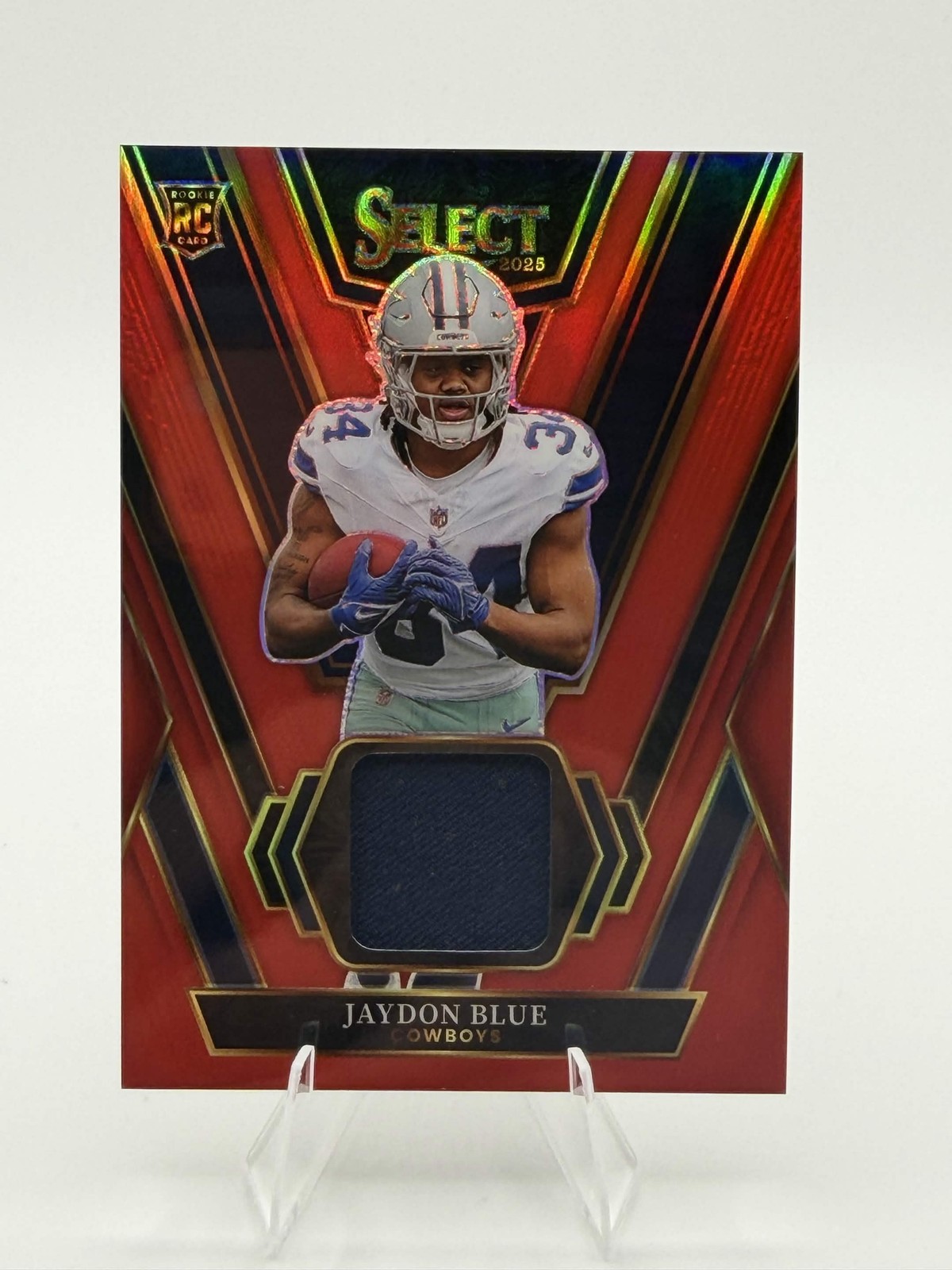 2025 Panini Select #RSW-JBE Jaydon Blue Rookie Swatches Red Prizm