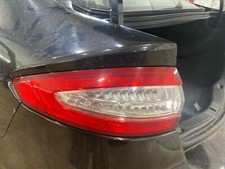 Used Left Tail Light Assembly fits: 2015 Ford Fusion quarter panel mounted LED H