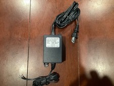 NIB NOS 12 volt 1.5 amp 1500 ma dc plug in power supply with plug and cord