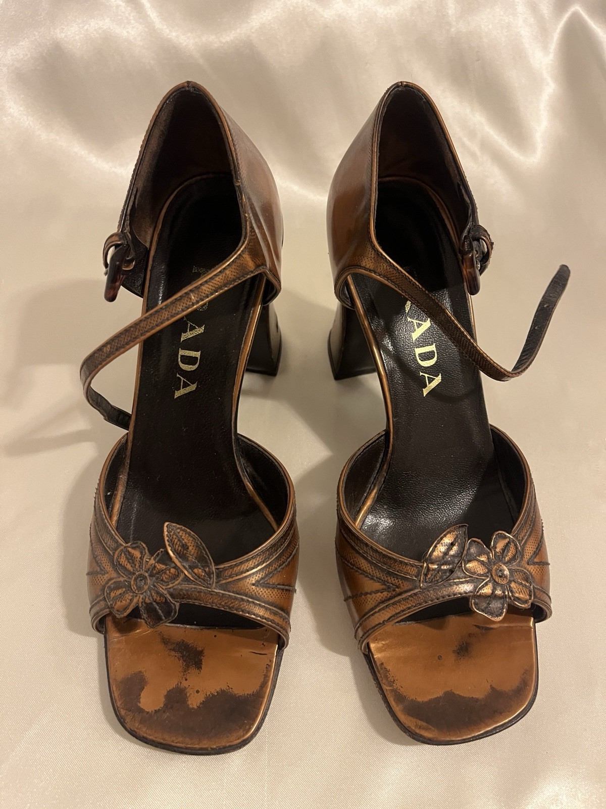 Prada tan leather heels with elegant floral accents for any occasion-image