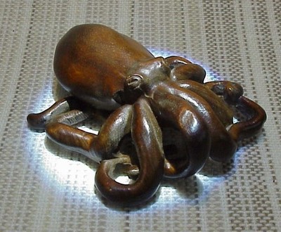 Hand carved boxwood octopus netsuke style