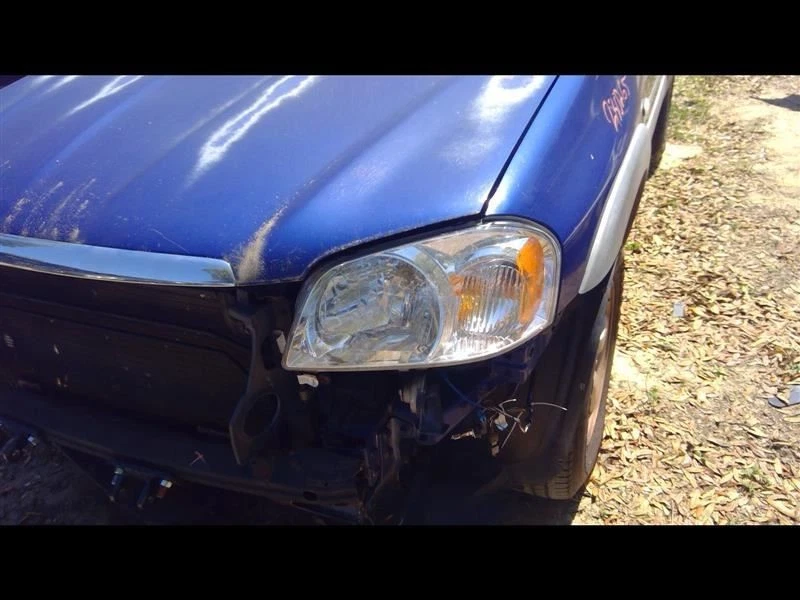 TRIBUTE 2006 Rocker Panel Moulding PASSENGER SIDE 746119 Foto 4 de 4