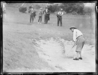 Golfer Fred Popplewell hitting a golf ball out of a sand bunker, N - Old Photo