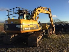 Photo 12x8 JCB and hay bales Cilfrew JCB and bales of hay at Bryncaws farm c2017