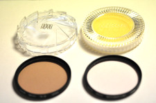 Pair of Hoya 58mm filters. A skylight 1B and a FL-D. With plastic cases.