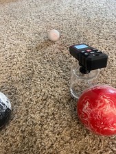 Laser bocce ball measuring device