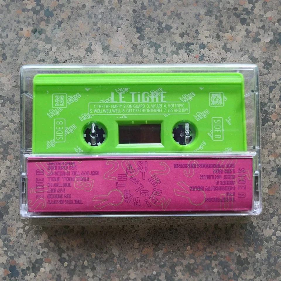 Le Tigre Great Hits Cassette Tape Rare Hot Pink Lime Green 2023 Brand New - Image 3 of 4