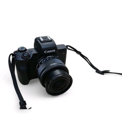 Canon EOS M50 Mirrorless Camera Bundle: 15-45mm Lens, Charger, Battery & Bag