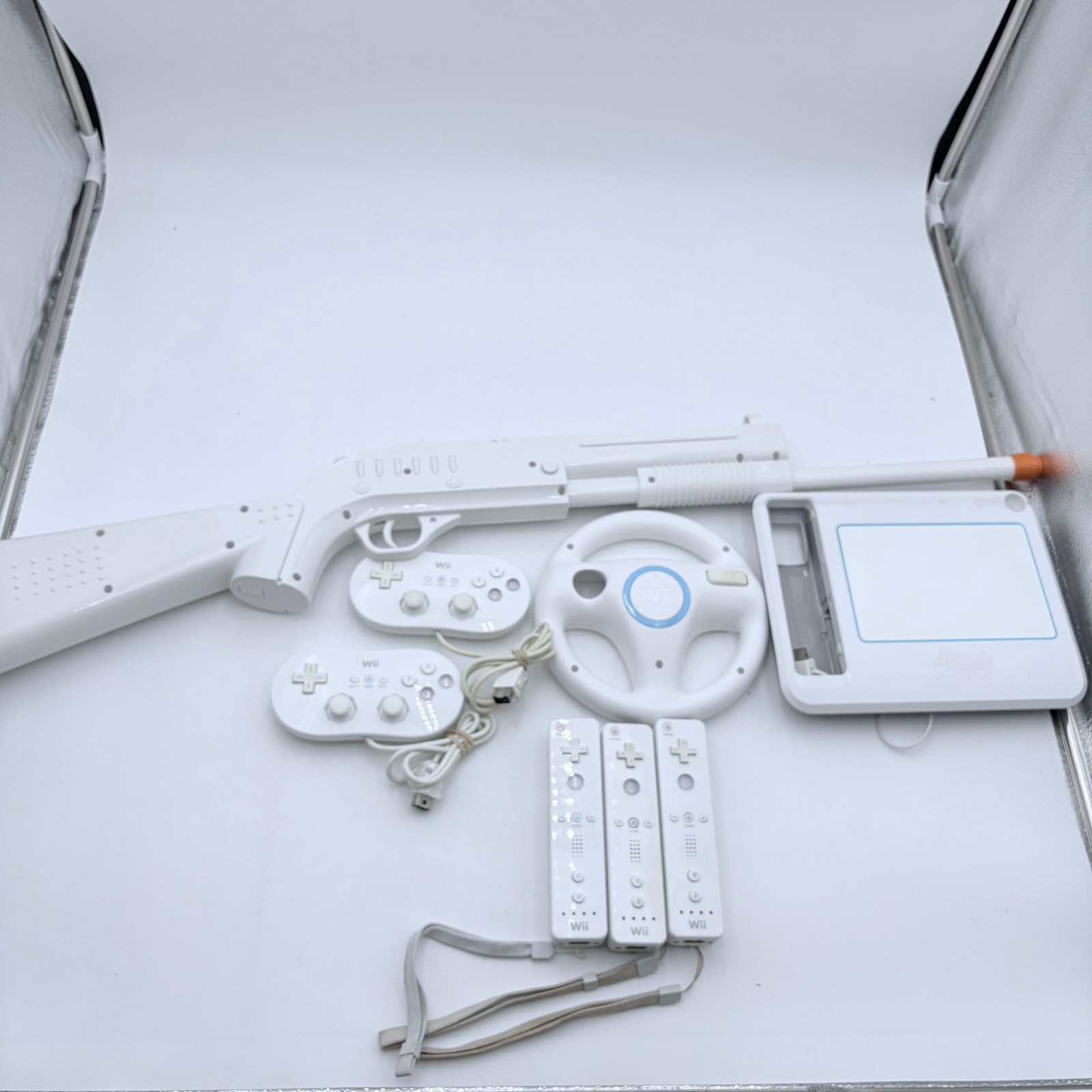 Nintendo Wii Controller Lot with Gun, Wheel, Two Gamepads, Three Controllers, Dr