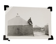 WW2 Photo U.S. Army GI Sitting On Top Of Canvas Tent Base Encampment