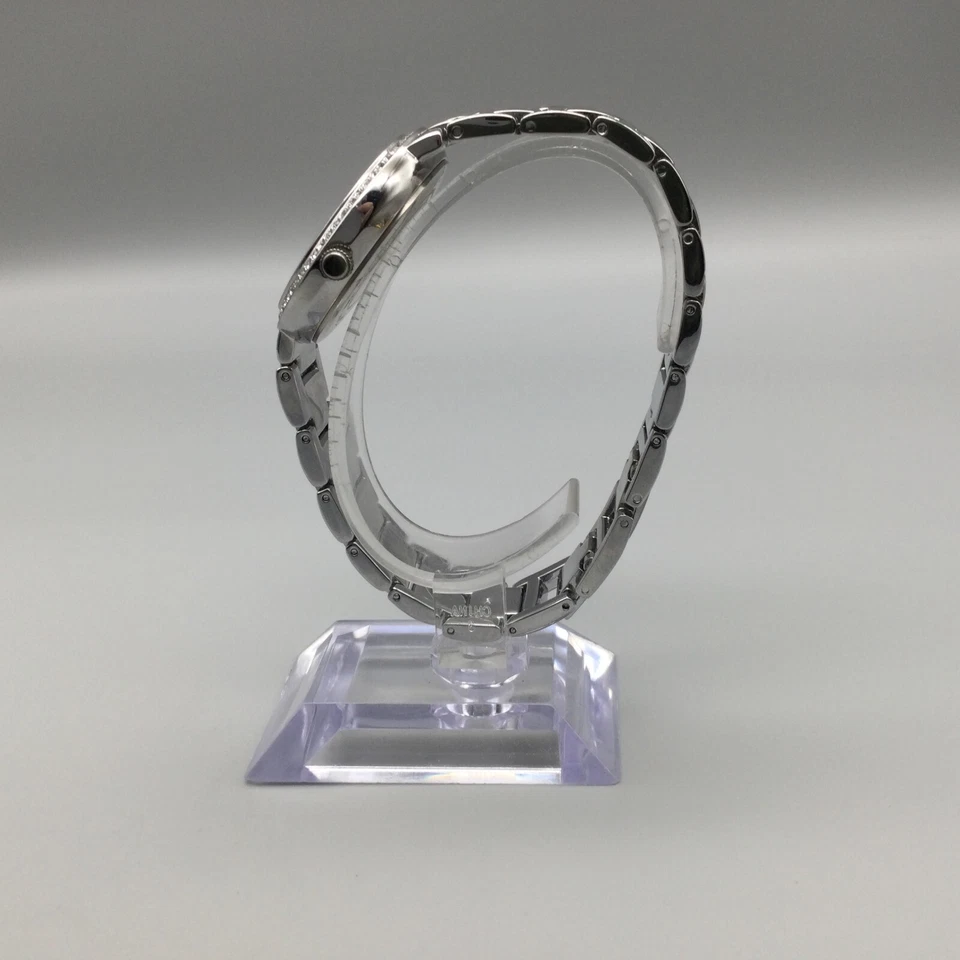 Reloj Armitron Now Mujer 34mm Tono Plateado Brillante Rosa Esfera MOP Batería Nueva 8" Foto 3 de 4