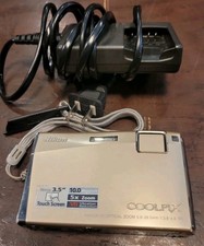 Nikon COOLPIX S60 10.0MP Digital Camera - Platinum Bronze With Charger