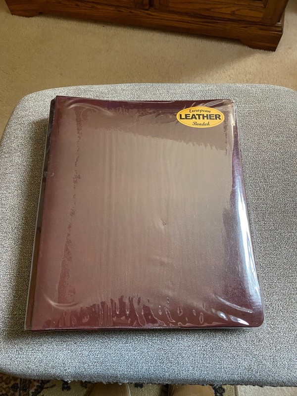 A Beautiful Brand new European IMPRESS E leather coin holder (flip )