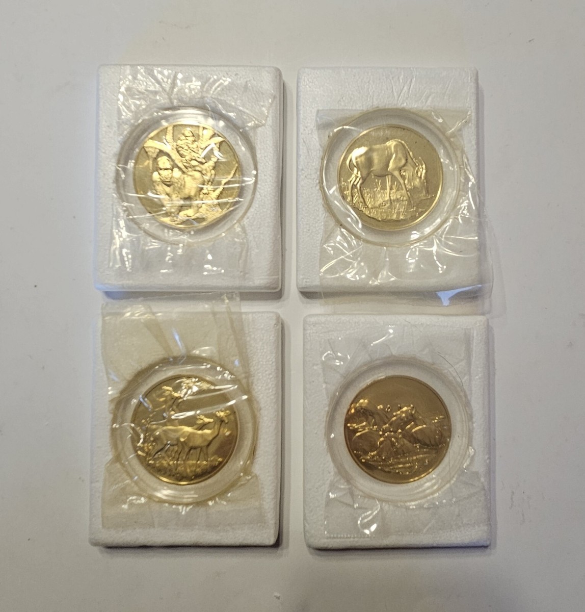 Four - 1000 grain Silver Medal Coins. Franklin Mint - East African