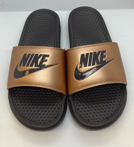 bronze nike slides