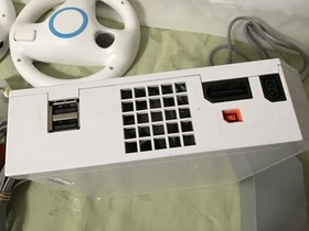 Wii nintendo console & accessories, remote, wheels, nunchuck, power cord,, works