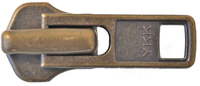 Corredera YKK para cremalleras con cadena metálica de 8 mm bruñida, dorada + plateada