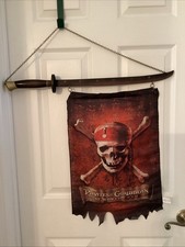 Pirates of the Caribbean Wall Hanging Sword with Flag RARE Disney Store  25 x 15