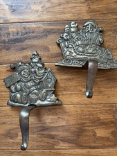 Grandeur Noel Cast iron santa sleigh snowman stocking holder hanger Lot Of 2