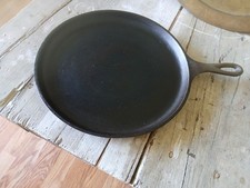 Lodge L9OGD Cast Iron round Griddle, Pre-Seasoned, 10.5-Inch - Made in USA, Comp