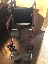 Medline Lightweight Foldable Transport Wheelchair with handbrakes