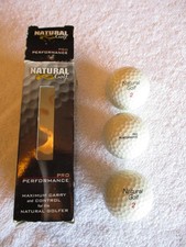 BALLES DE GOLF NATURAL GOLF PRO PERFORMANCE 1 MANCHE de 3 BALLES RARES MOE NORMAN ?