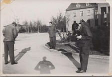 WW2 Photo of Soldiers Talking on Paved Village Road